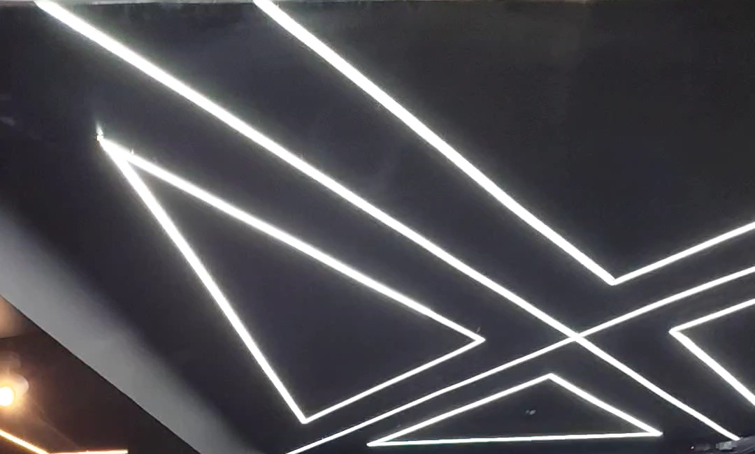 LED lines forming triangles on the ceiling